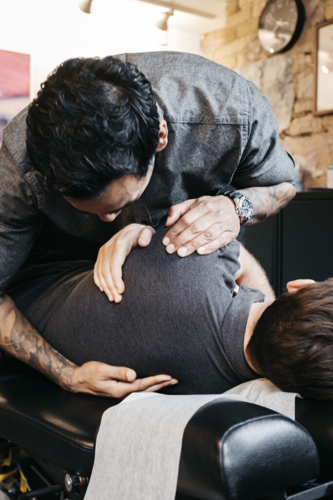 Totum Life Science Toronto | A professional physiotherapist working on a client | Homes Almanac