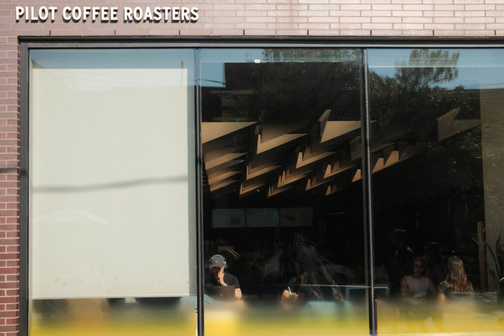 Pilot Coffee Roasters on Ossington | Floor to ceiling windows of coffee shop | Homes Almanac