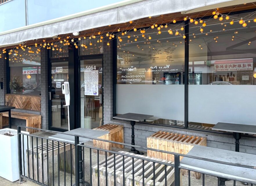 Chau Cafe | Exterior of restaurant with outdoor seating and string lights | Homes Almanac