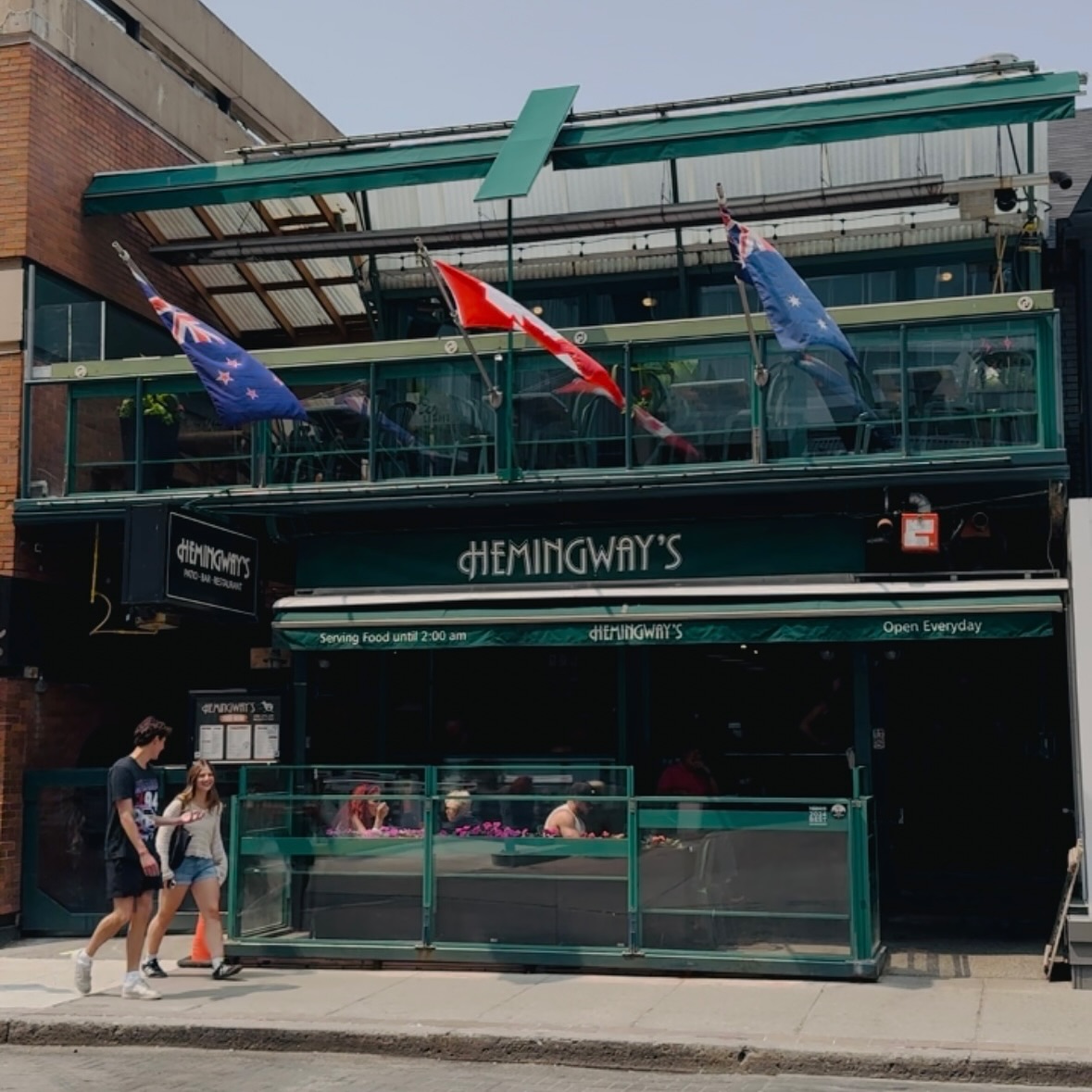 Hemingway's Restaurant and Bar | Exterior of restaurant with green sign | Homes Almanac