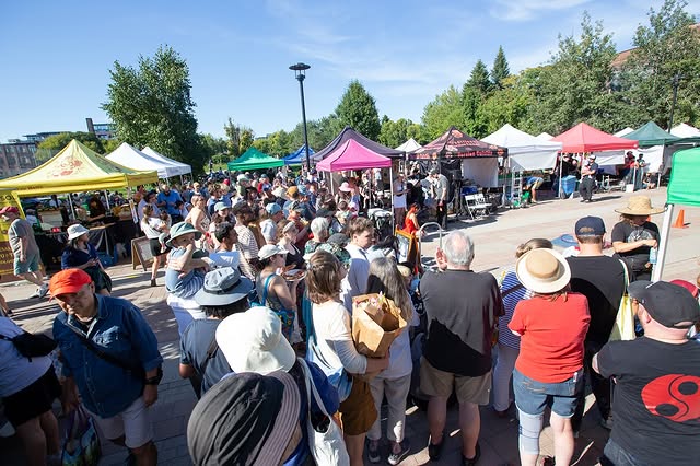 Toronto Farmers Markets | People gathered together at the Sorauren Market | Homes Almanac