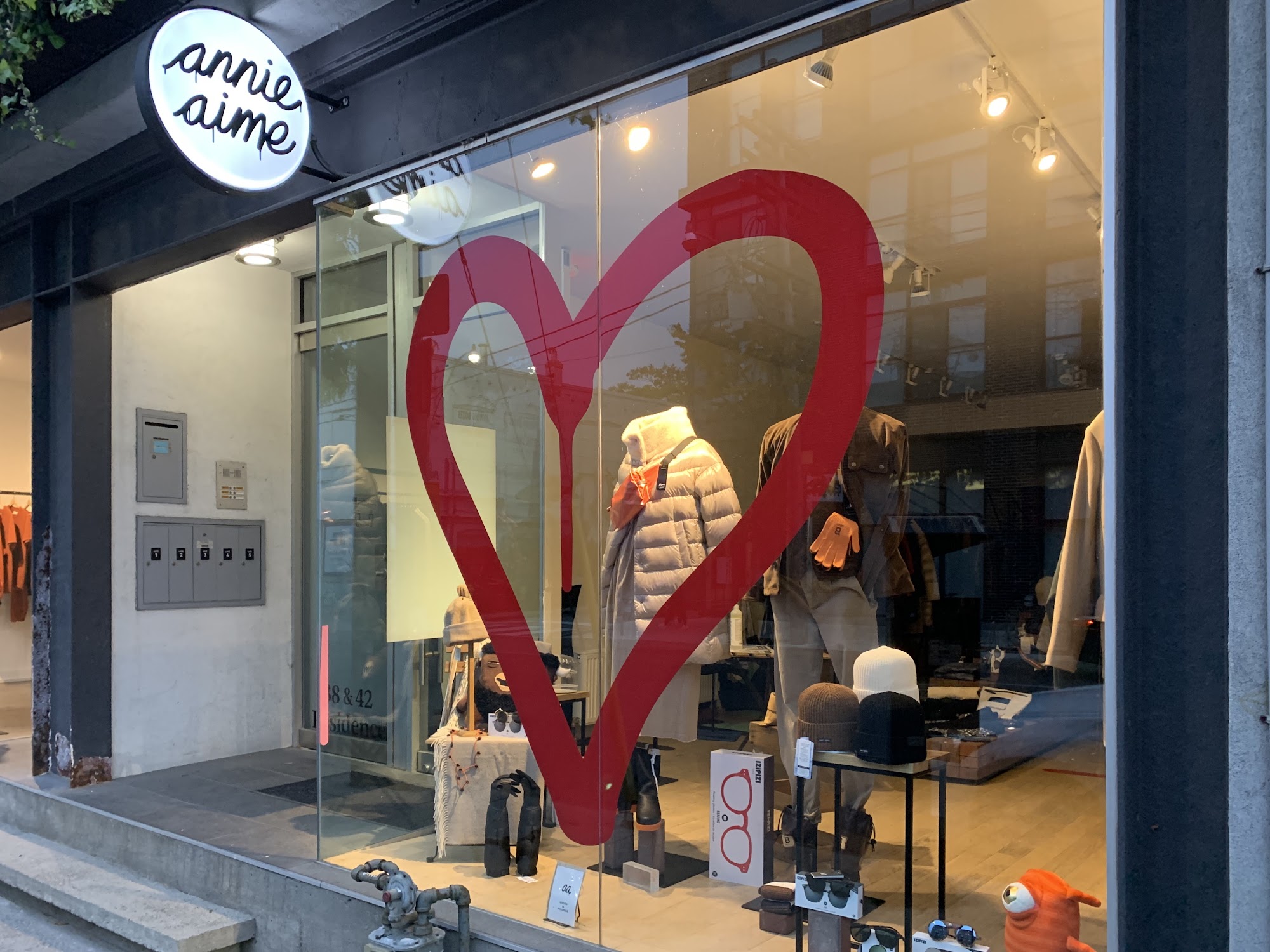 Annie Aime | Exterior of shop with a red heart painted on the front window | Homes Almanac