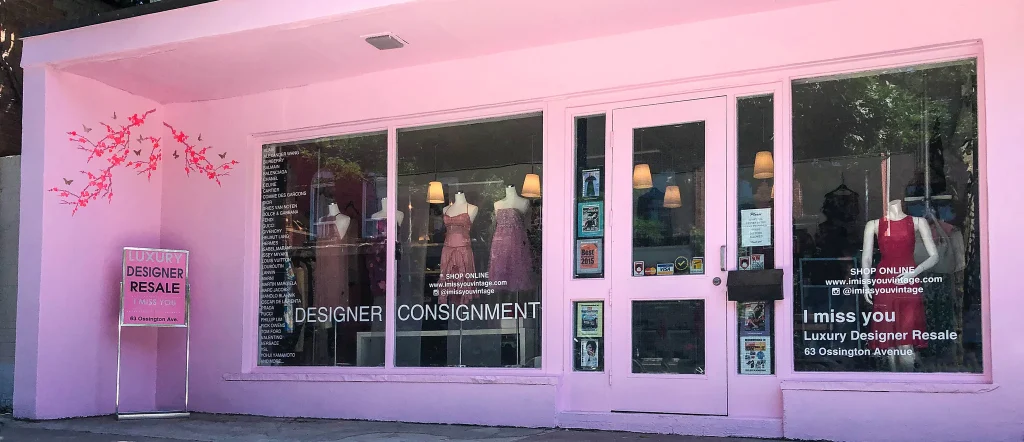I Miss You Vintage | A pink storefront with mannequins in dresses seen through the window | Homes Almanac